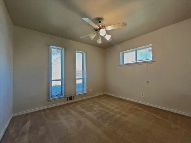 3614 Matador Dr, Garland, TX 75042 - carpeted empty room featuring baseboards and ceiling fan