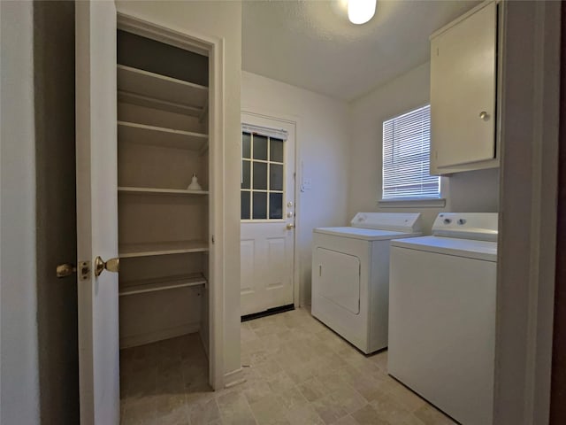 3614 Matador Dr, Garland, TX 75042 - washroom with cabinet space and washer and dryer