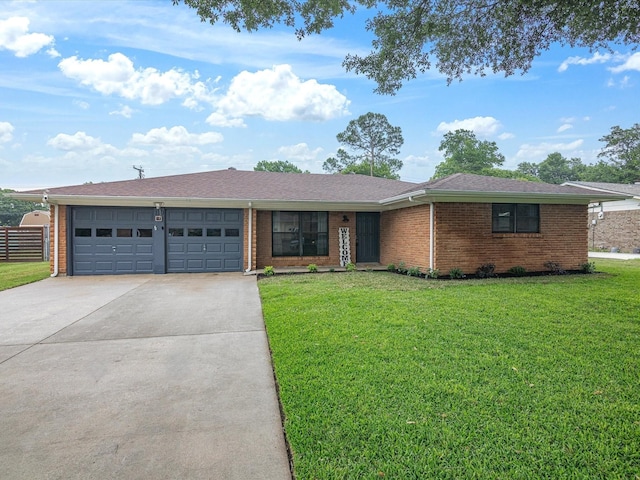 110 N Willow St, Mansfield, TX 76063 - ranch-style house with brick siding, a garage, and concrete driveway