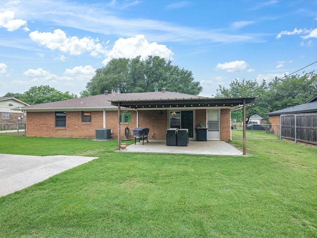 110 N Willow St, Mansfield, TX 76063 - back of house with central AC, a patio, and brick siding