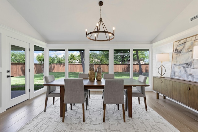 5009 Stacey Ave, Fort Worth, TX 76132 - sunroom with vaulted ceiling, a chandelier, and healthy amount of natural light