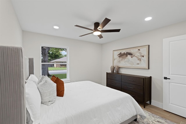5009 Stacey Ave, Fort Worth, TX 76132 - bedroom featuring light wood-style flooring, recessed lighting, ceiling fan, and baseboards