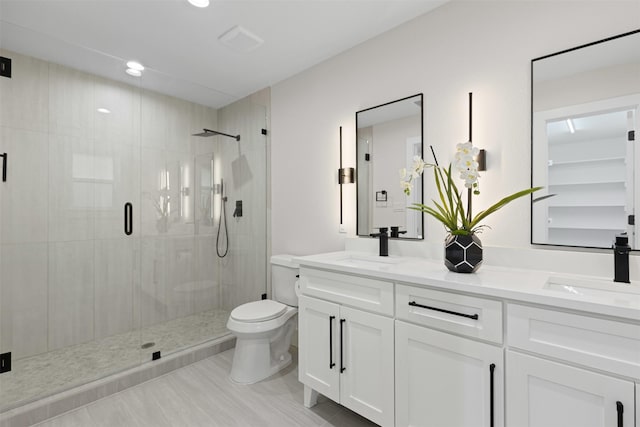 5009 Stacey Ave, Fort Worth, TX 76132 - full bath featuring toilet, a stall shower, and double vanity