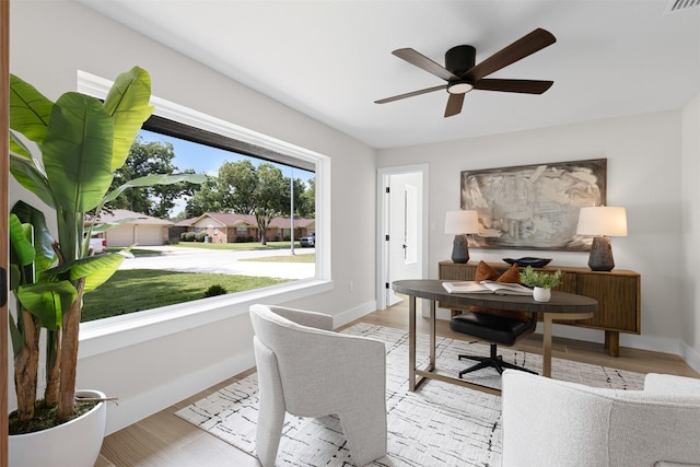 5009 Stacey Ave, Fort Worth, TX 76132 - home office featuring ceiling fan, light wood-type flooring, and baseboards