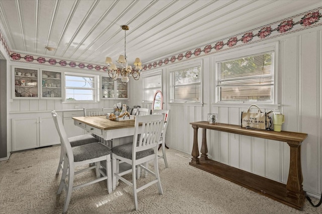 5401 Roberts St, Greenville, TX 75402 - dining room with a chandelier and light colored carpet