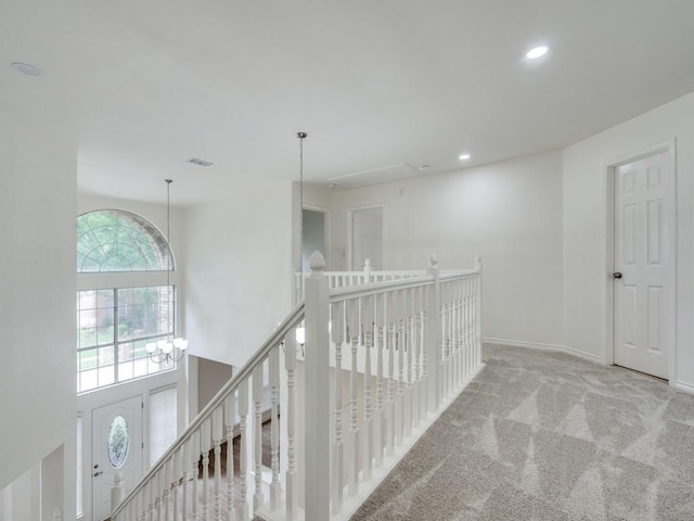 1428 Charlotte Way, Carrollton, TX 75007 - hallway with an upstairs landing, carpet, attic access, recessed lighting, and baseboards