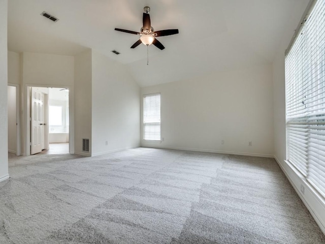 1428 Charlotte Way, Carrollton, TX 75007 - spare room with ceiling fan, lofted ceiling, light carpet, and baseboards
