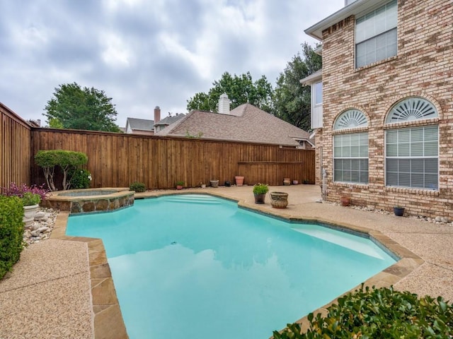 1428 Charlotte Way, Carrollton, TX 75007 - view of swimming pool with a fenced backyard, a patio, and a pool with connected hot tub