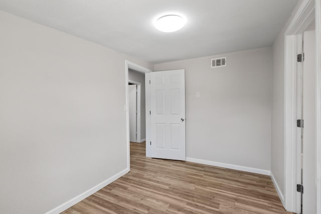 903 1st St, Bridgeport, TX 76426 - unfurnished room with baseboards and light wood finished floors