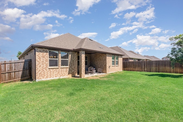 3021 Cobalt Dr, Aubrey, TX 76227 - back of house featuring brick siding, a patio area, and roof with shingles