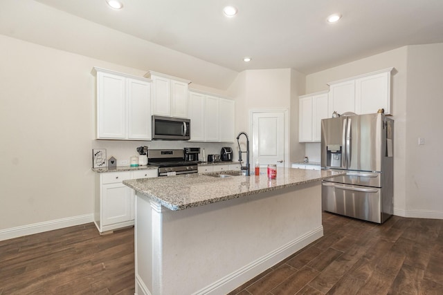 3021 Cobalt Dr, Aubrey, TX 76227 - kitchen featuring appliances with stainless steel finishes, dark wood finished floors, baseboards, a kitchen island with sink, and recessed lighting
