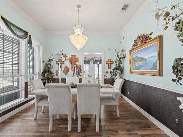 3709 Cliff View Loop, Weatherford, TX 76087 - dining area with a chandelier, plenty of natural light, ornamental molding, and wood finished floors