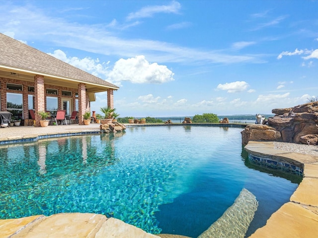 3709 Cliff View Loop, Weatherford, TX 76087 - view of swimming pool with an infinity pool and a patio