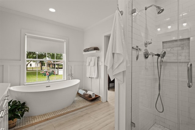 4675 County Road 2216, Caddo Mills, TX 75135 - bathroom featuring a shower stall, crown molding, wood finished floors, wainscoting, and a decorative wall