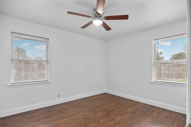 3334 Modlin St, Dallas, TX 75228 - empty room with dark wood-style floors, baseboards, and ceiling fan