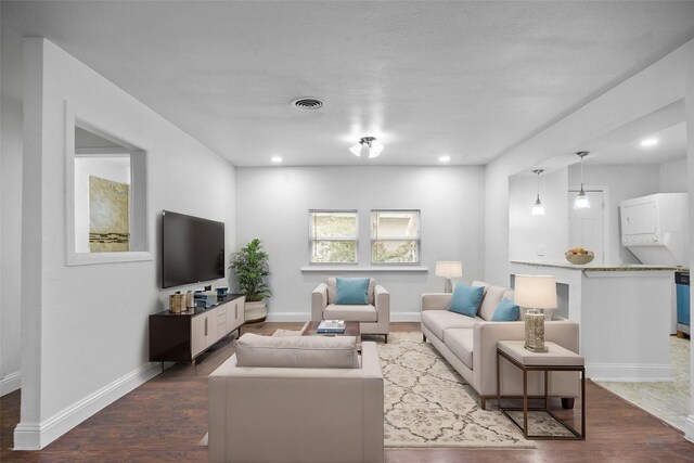 3334 Modlin St, Dallas, TX 75228 - living area with wood finished floors, baseboards, and recessed lighting