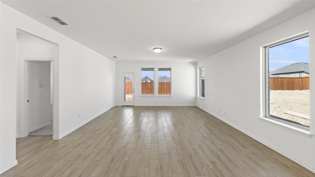 7545 Wild Mint Trl, Midlothian, TX 76084 - spare room featuring light wood finished floors and baseboards