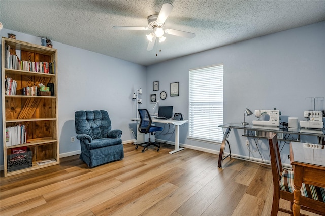 508 Fox Trl, Greenville, TX 75402 - office space with wood finished floors, ceiling fan, a textured ceiling, and baseboards