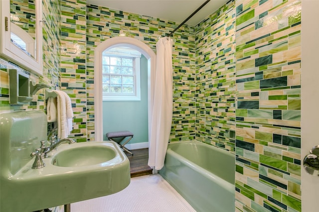 2916 Sale St, Dallas, TX 75219 - full bathroom with shower / bathtub combination with curtain, baseboards, and tile patterned flooring
