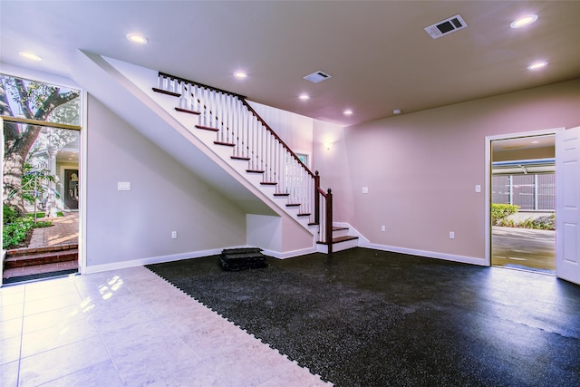 2916 Sale St, Dallas, TX 75219 - unfurnished living room featuring stairway, recessed lighting, baseboards, and healthy amount of natural light