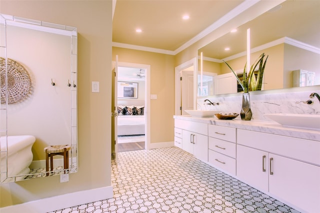 2916 Sale St, Dallas, TX 75219 - full bath featuring double vanity, crown molding, ensuite bathroom, recessed lighting, and baseboards