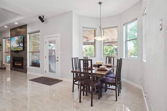 1302 Kelly Green Ct, Keller, TX 76248 - dining space featuring baseboards, a fireplace, and recessed lighting