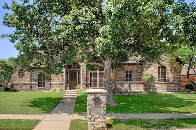 1302 Kelly Green Ct, Keller, TX 76248 - view of property hidden behind natural elements with brick siding and a front yard