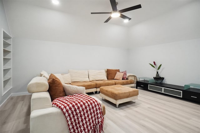 1302 Kelly Green Ct, Keller, TX 76248 - living room with light wood-style flooring, vaulted ceiling, a ceiling fan, and baseboards