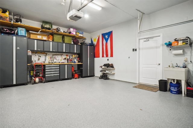1302 Kelly Green Ct, Keller, TX 76248 - garage with a garage door opener and a workshop area