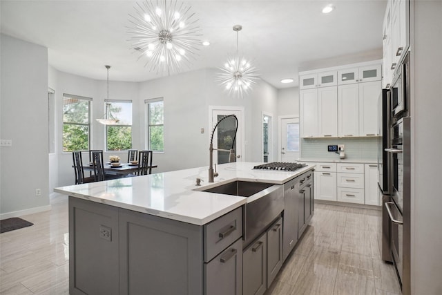 1302 Kelly Green Ct, Keller, TX 76248 - kitchen featuring gray cabinets, recessed lighting, a sink, baseboards, and plenty of natural light