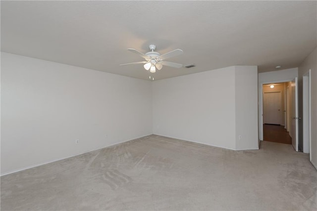 2913 Paddock Way, Denton, TX 76210 - empty room with ceiling fan and light colored carpet