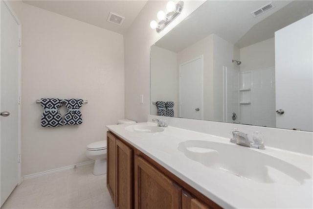 2913 Paddock Way, Denton, TX 76210 - full bath with toilet, double vanity, a shower, and baseboards