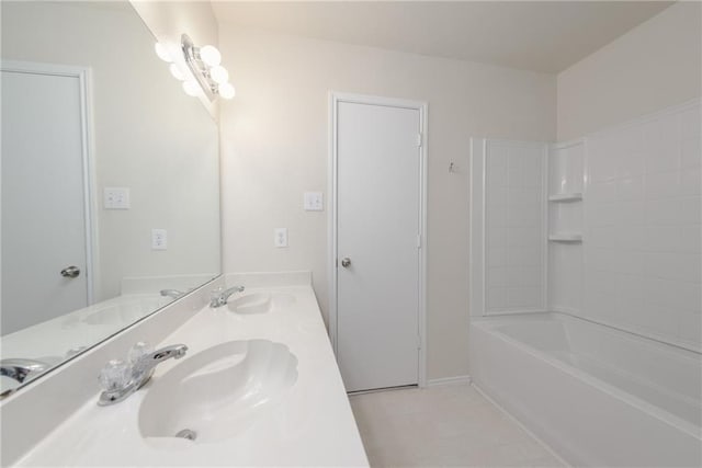 2913 Paddock Way, Denton, TX 76210 - bathroom with double vanity and  shower combination