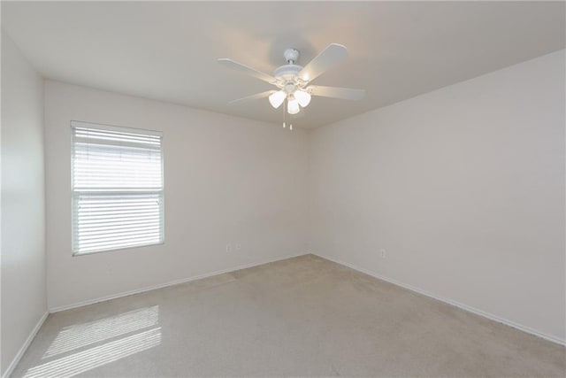2913 Paddock Way, Denton, TX 76210 - spare room with baseboards, light colored carpet, and ceiling fan