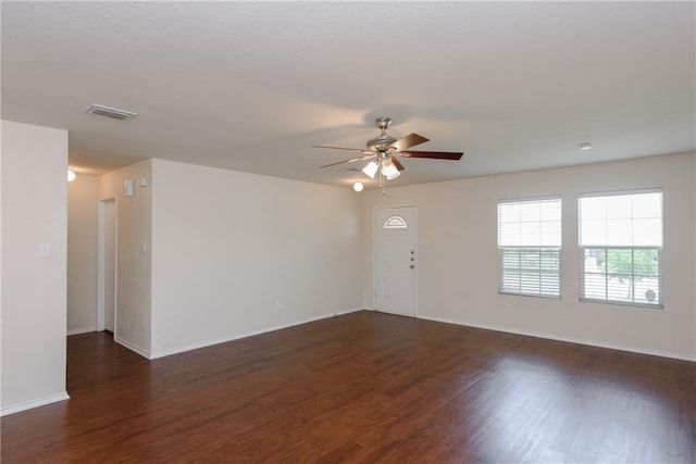 2913 Paddock Way, Denton, TX 76210 - empty room with a ceiling fan, wood finished floors, and baseboards