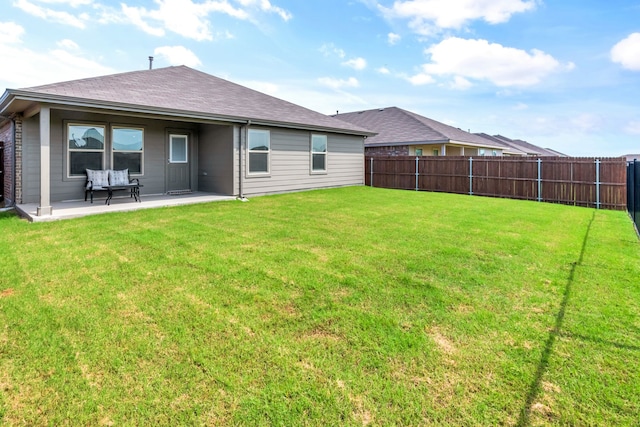 16637 Friesland Ln, Justin, TX 76247 - rear view of house featuring a patio and roof with shingles