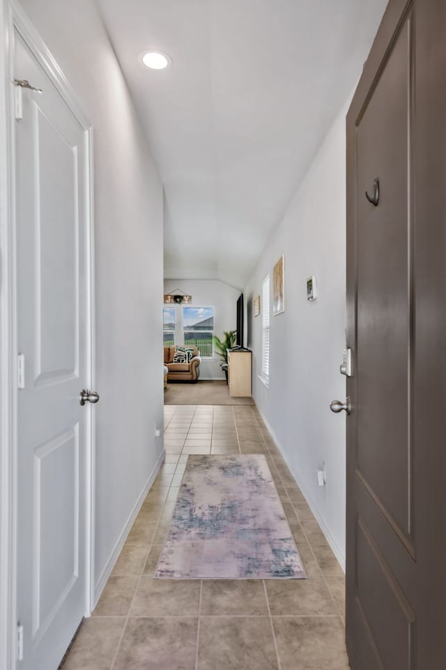 16637 Friesland Ln, Justin, TX 76247 - hallway with light tile patterned floors, vaulted ceiling, recessed lighting, and baseboards
