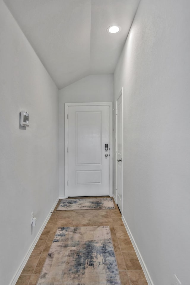 16637 Friesland Ln, Justin, TX 76247 - hall with vaulted ceiling, baseboards, light tile patterned floors, and recessed lighting