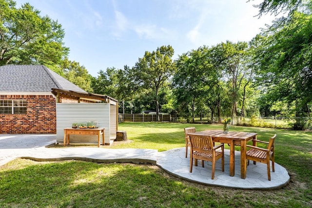 6881 Scenic Dr, Eustace, TX 75124 - view of yard with a patio area and view of wooded area