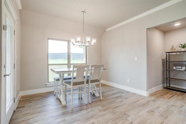 4017 Crick Ct, Weatherford, TX 76087 - dining room featuring a chandelier, crown molding, baseboards, and light wood-style floors