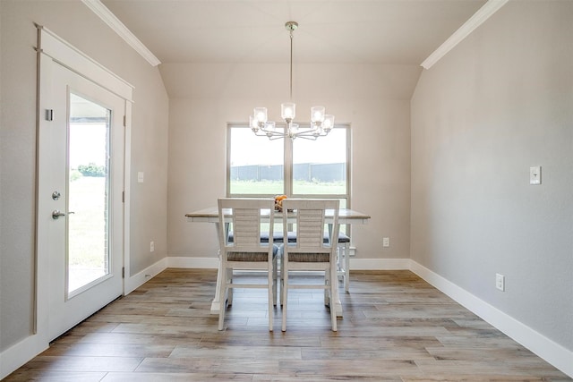4017 Crick Ct, Weatherford, TX 76087 - dining room with crown molding, a chandelier, light wood finished floors, baseboards, and vaulted ceiling