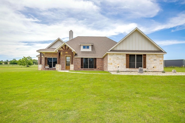 4017 Crick Ct, Weatherford, TX 76087 - craftsman-style house featuring board and batten siding, a chimney, a front yard, a shingled roof, and stone siding