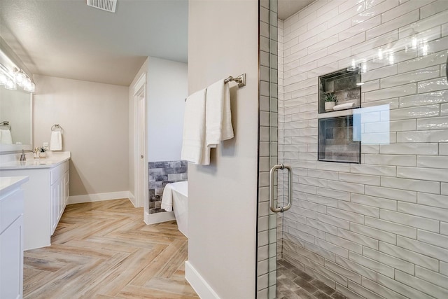 4017 Crick Ct, Weatherford, TX 76087 - full bath with vanity, a soaking tub, a shower stall, and baseboards