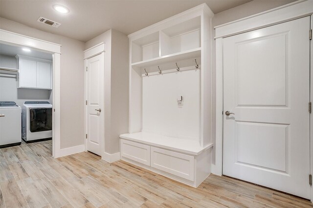 4017 Crick Ct, Weatherford, TX 76087 - mudroom with independent washer and dryer, light wood-style flooring, baseboards, and recessed lighting