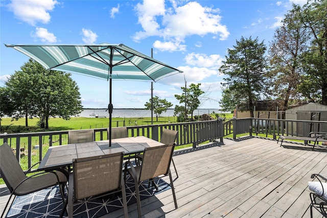 400 Causeway Vw, Seven Points, TX 75143 - wooden deck with a water view, a lawn, and outdoor dining space