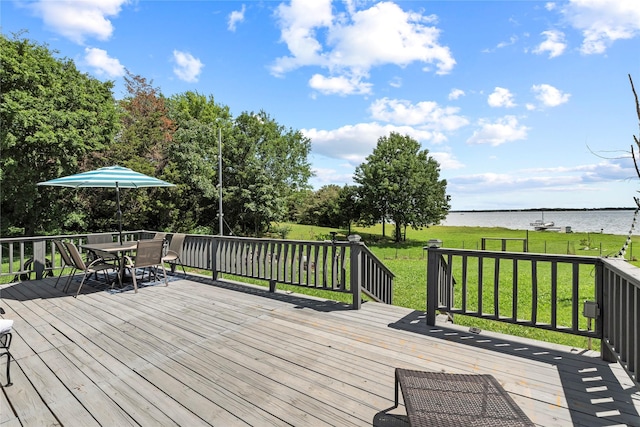 400 Causeway Vw, Seven Points, TX 75143 - deck featuring a water view, a lawn, and outdoor dining area