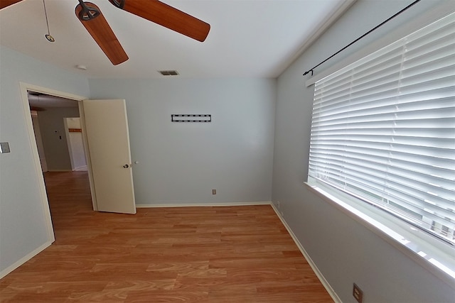1602 England Rd, Arlington, TX 76013 - spare room featuring a ceiling fan, light wood-style flooring, and baseboards