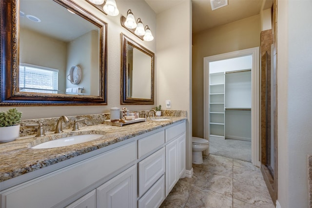 3331 Preston Club Dr, Sherman, TX 75092 - full bathroom with double vanity, toilet, and a shower