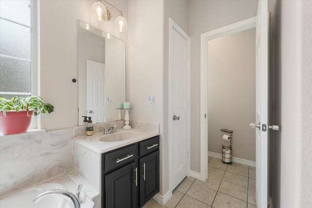 210 Sendero Dr, Waxahachie, TX 75165 - full bathroom featuring vanity, tile patterned flooring, and a tub