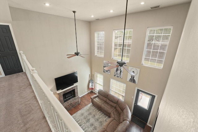 210 Sendero Dr, Waxahachie, TX 75165 - living area featuring a ceiling fan, recessed lighting, a brick fireplace, and baseboards